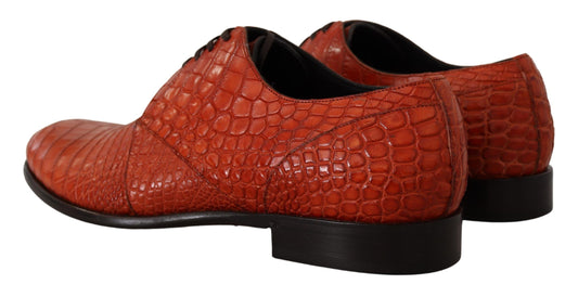 Red shoes with a crocodile skin texture design