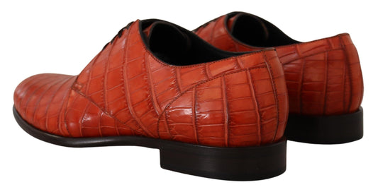 Red leather shoes with a shiny finish and black soles