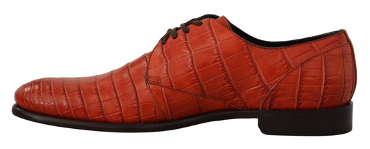 Red patent leather shoes with laces and a small heel