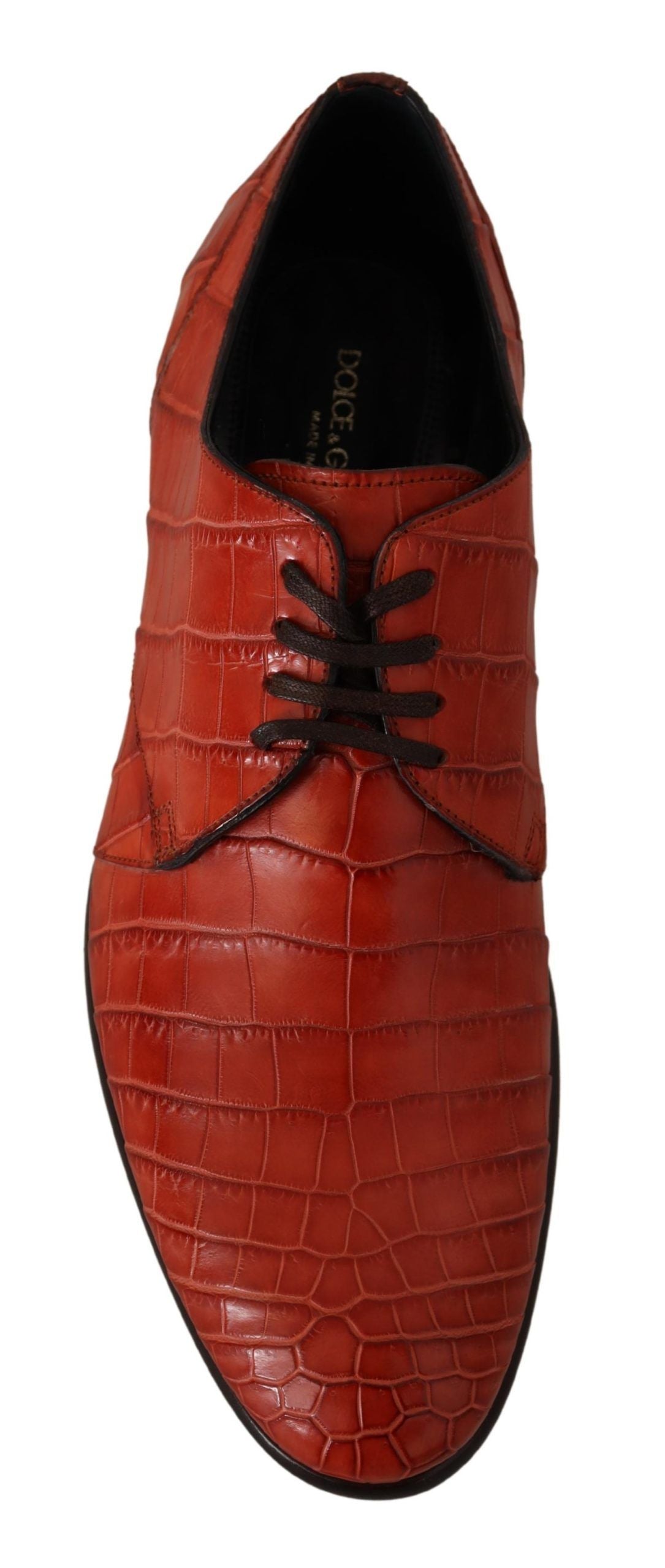 Red leather dress shoe with laces and a pointed toe
