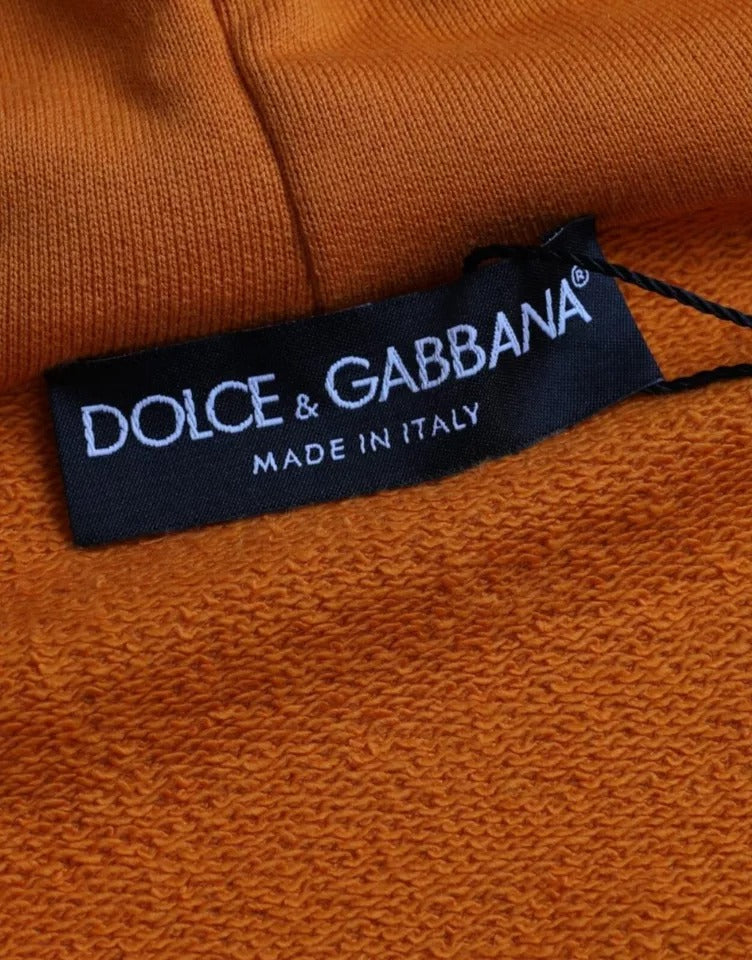 Orange sweater with black label