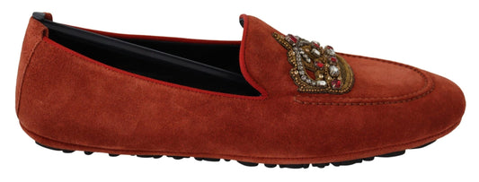 Red velvet loafers with gold embroidery and buckle detailing