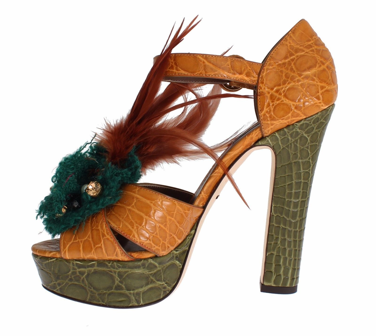 High heel shoe with a feather embellishment on top and a crocodile skin texture