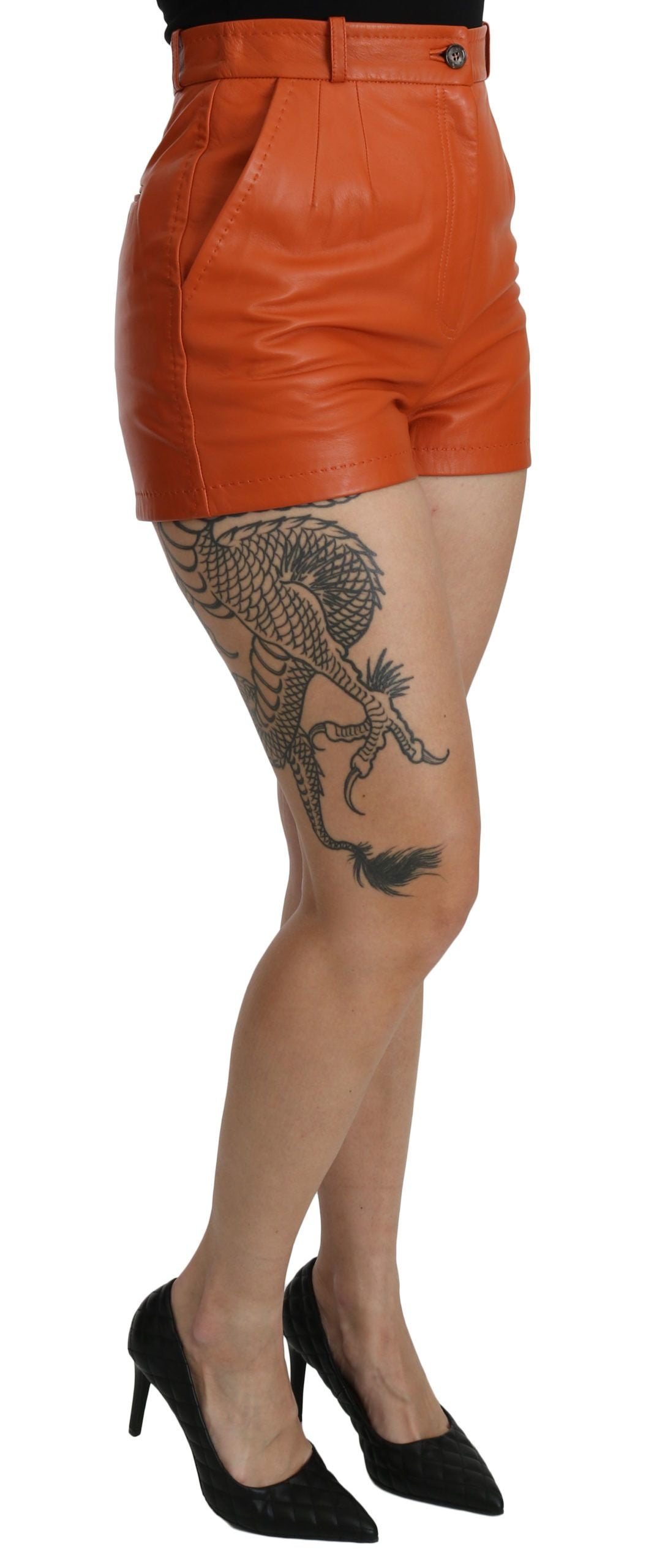 Woman wearing red shorts and black shoes