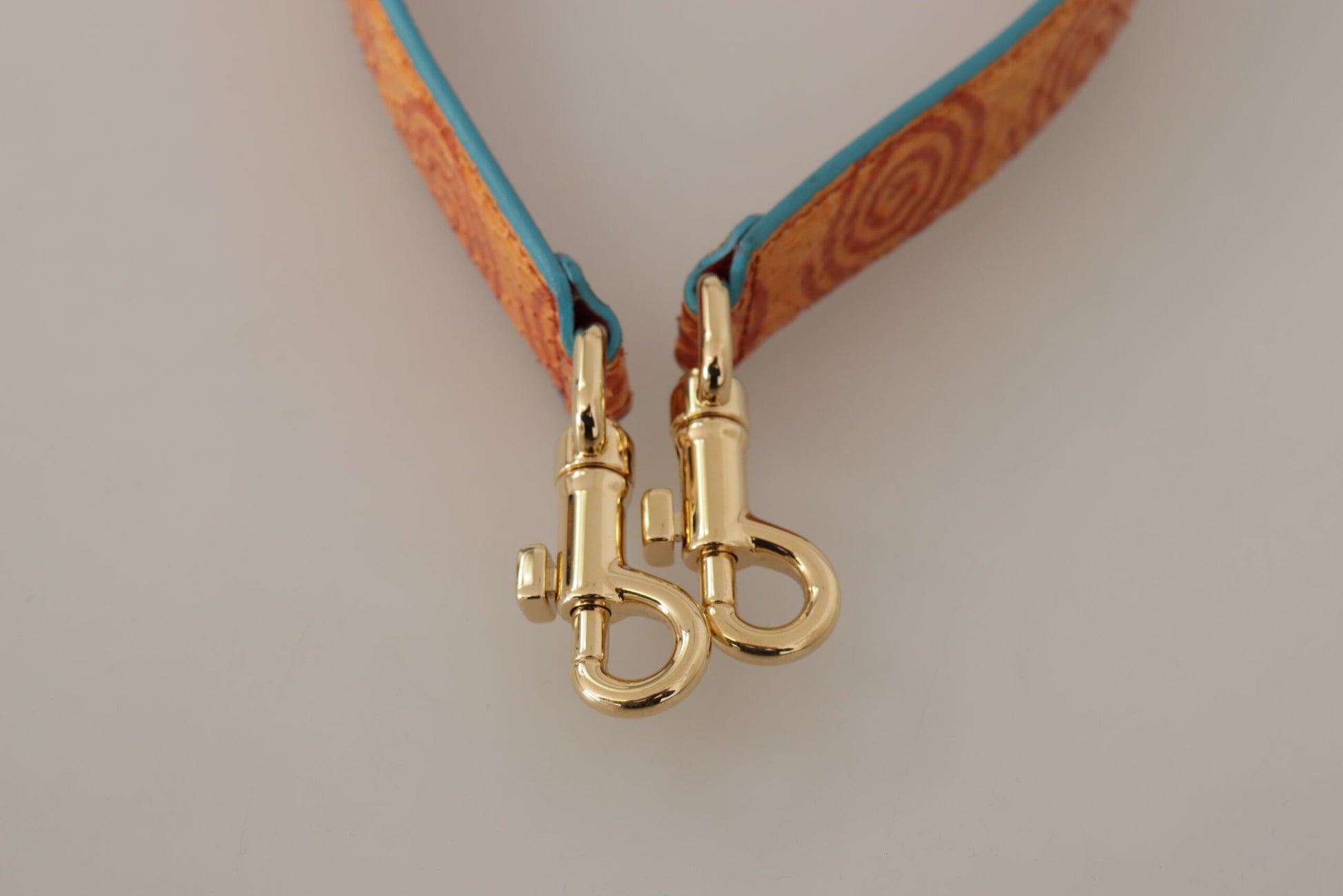 Gold hooks on leather cord