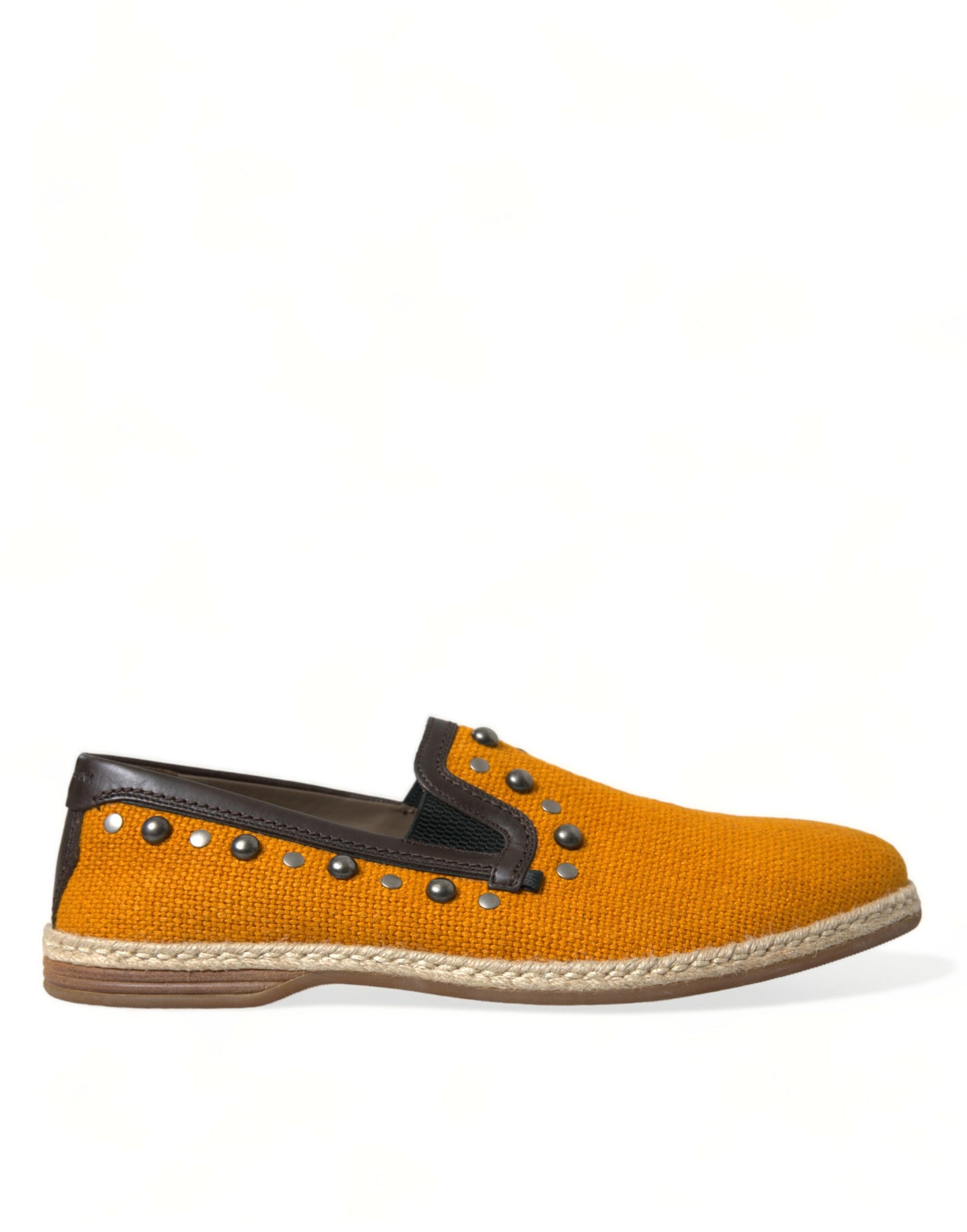 Yellow suede shoe with black laces and a wedge heel