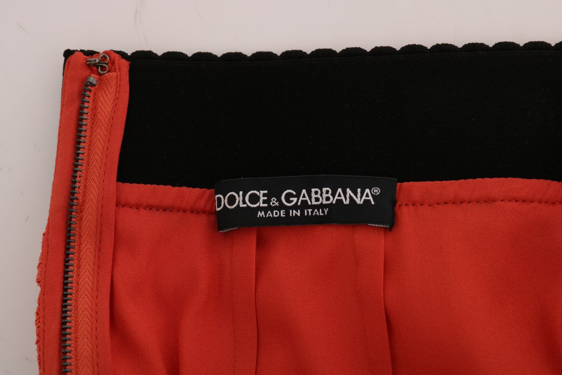 Red and black fabric item with zipper