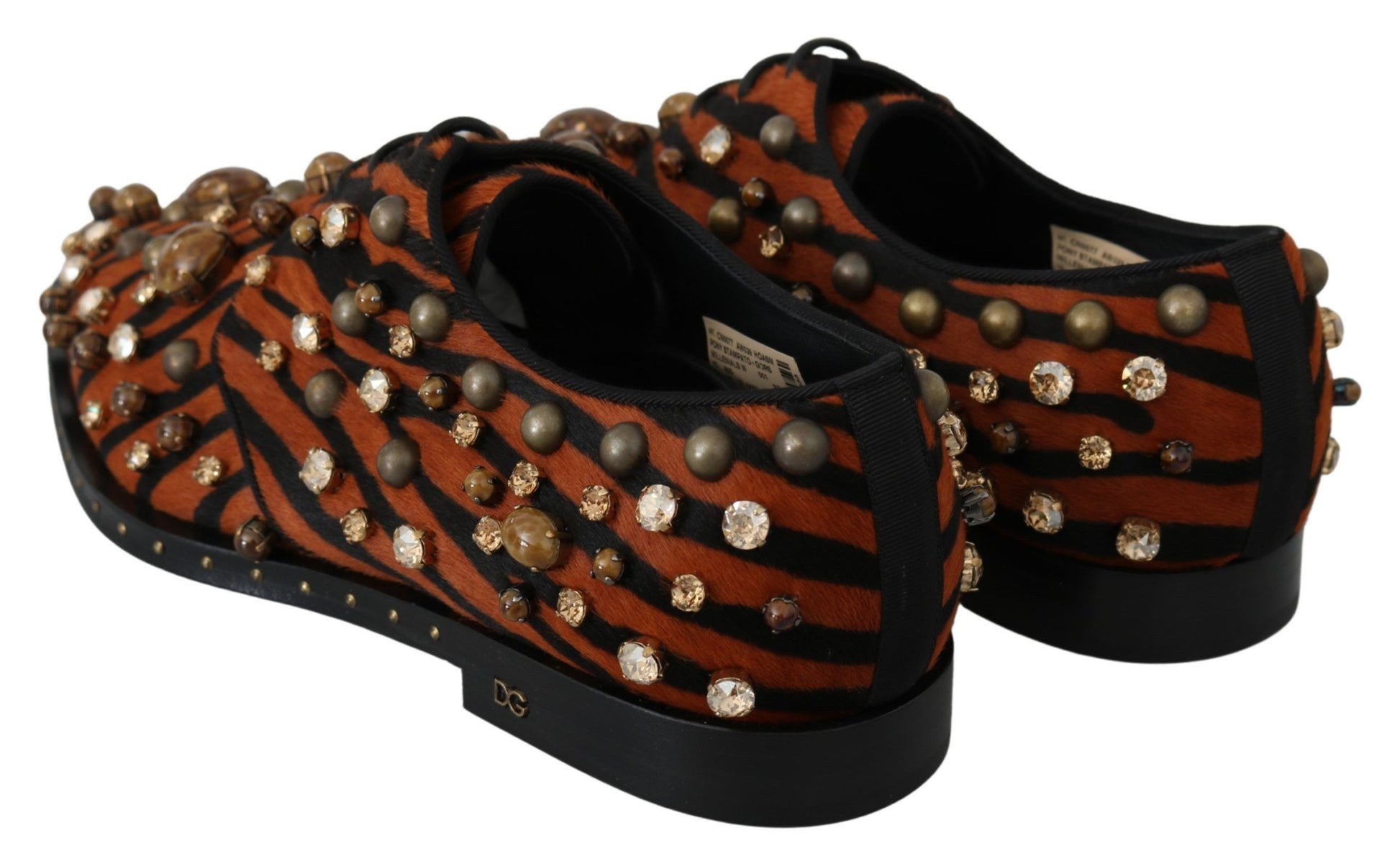 Pair of shoes with embellishments and a patterned design