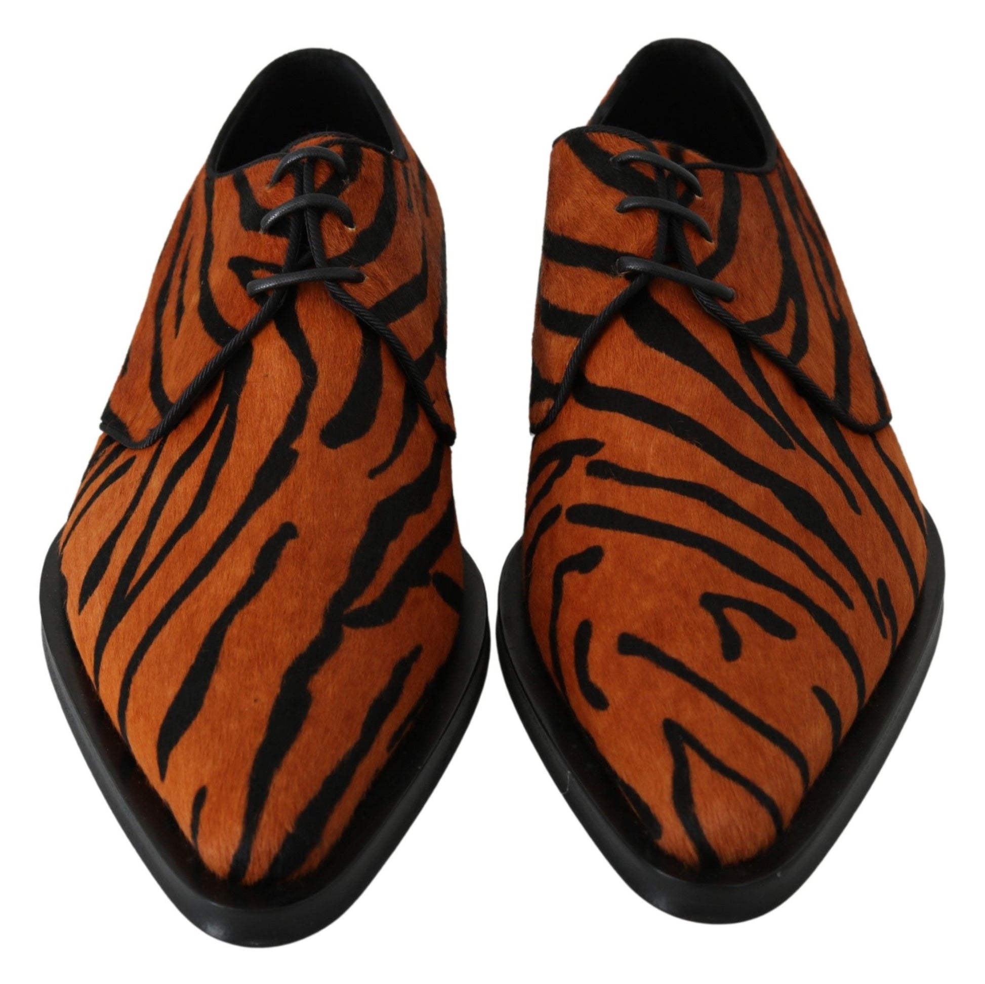 Pair of men's shoes with tiger print design and black laces