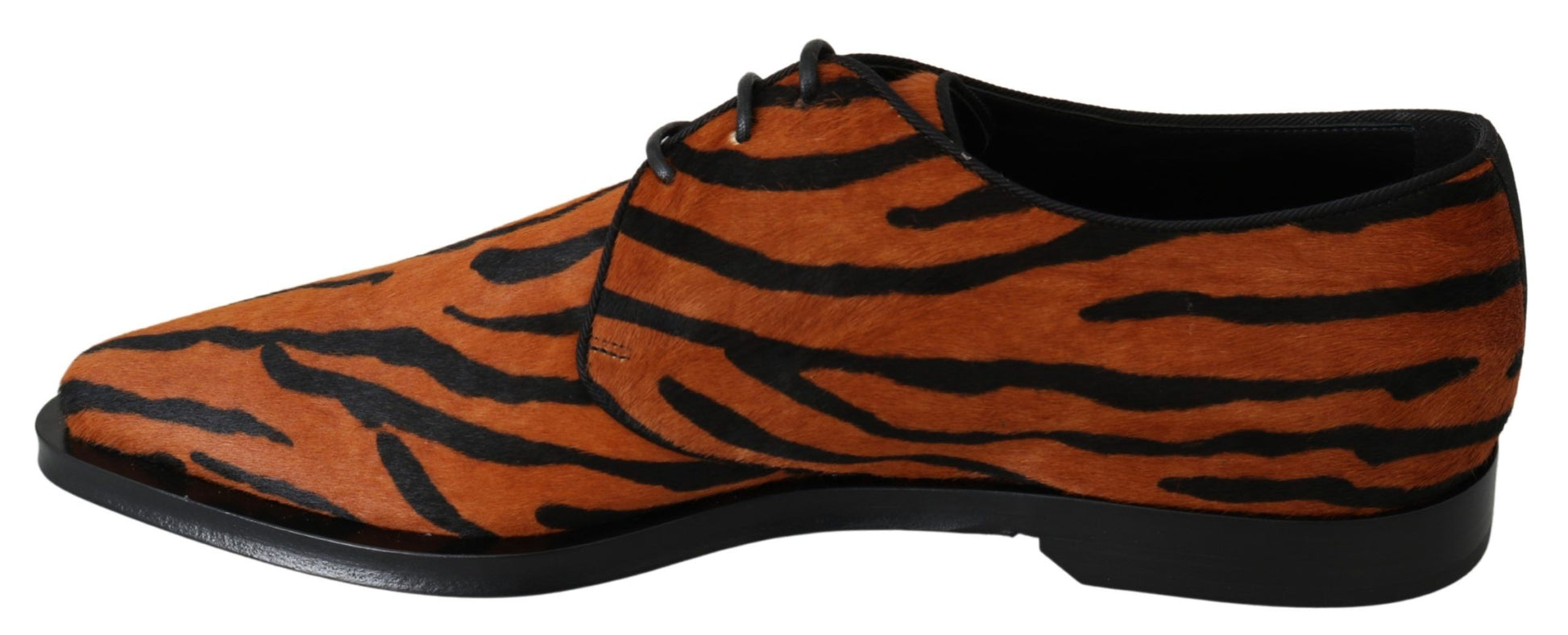 Pair of men's shoes with tiger print design