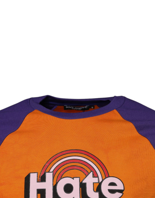 Orange long sleeve shirt with "HATE" written on front in white letters