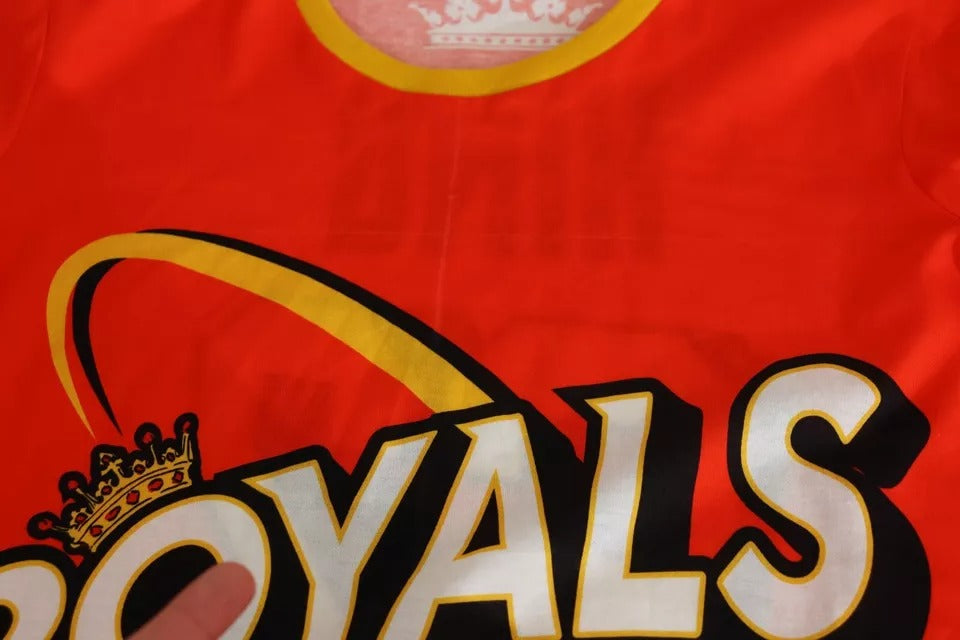 Red jersey with white lettering for a sports team