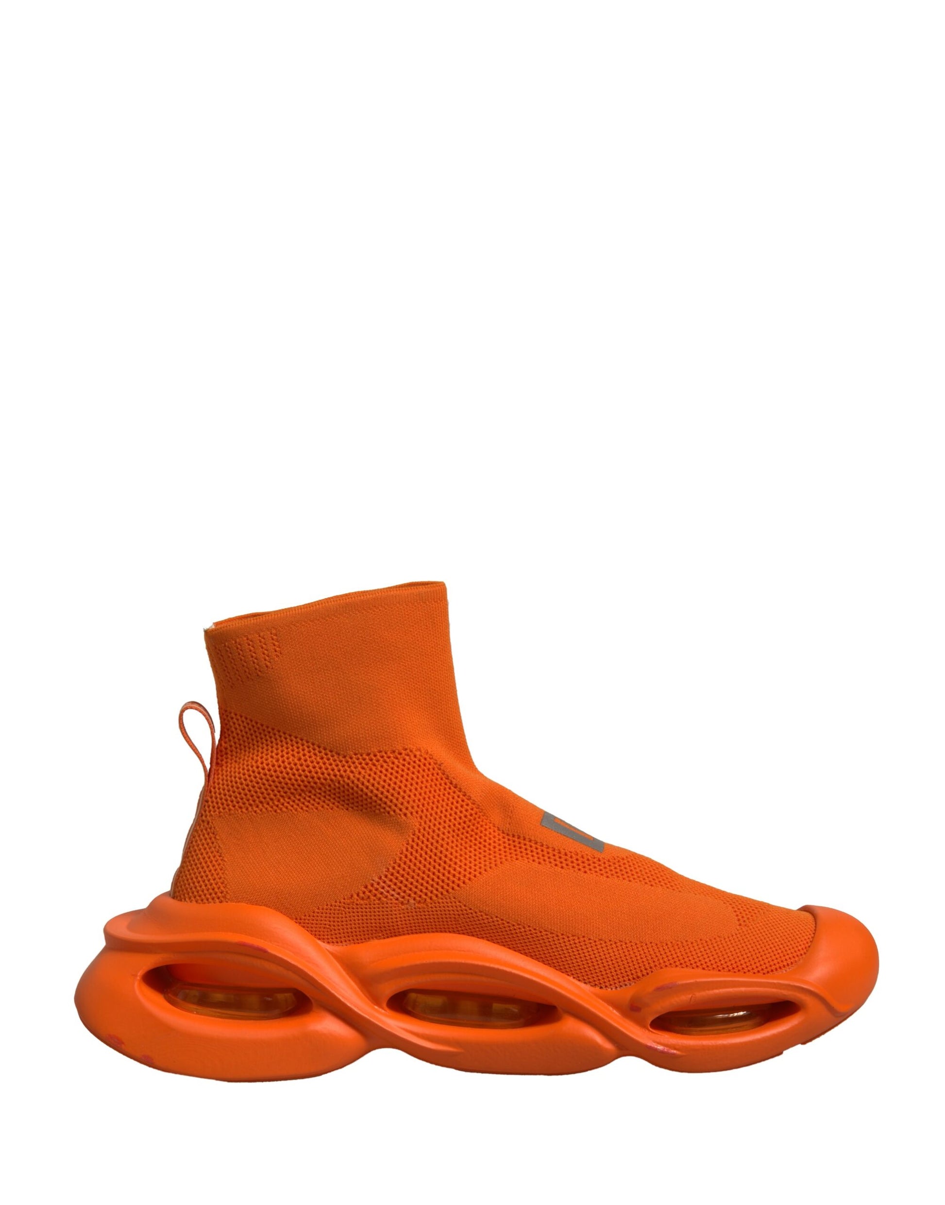 Orange shoe with red sole