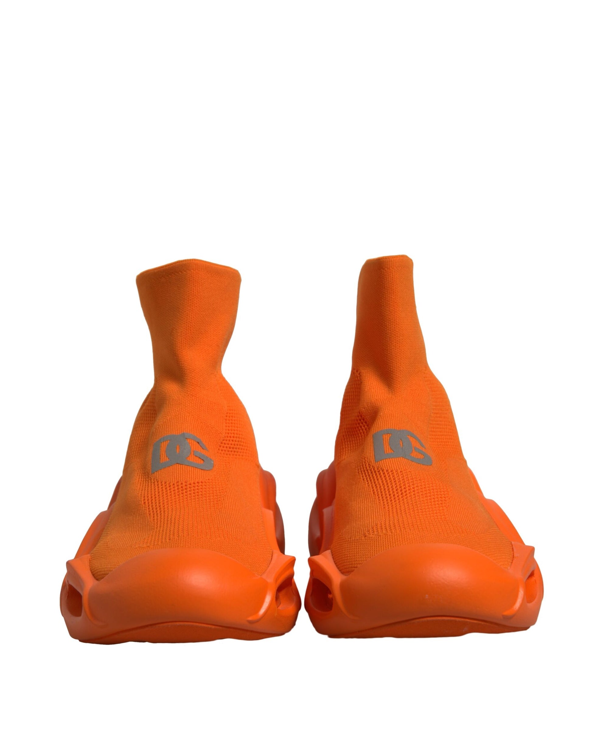 Orange athletic shoes with white logo on side