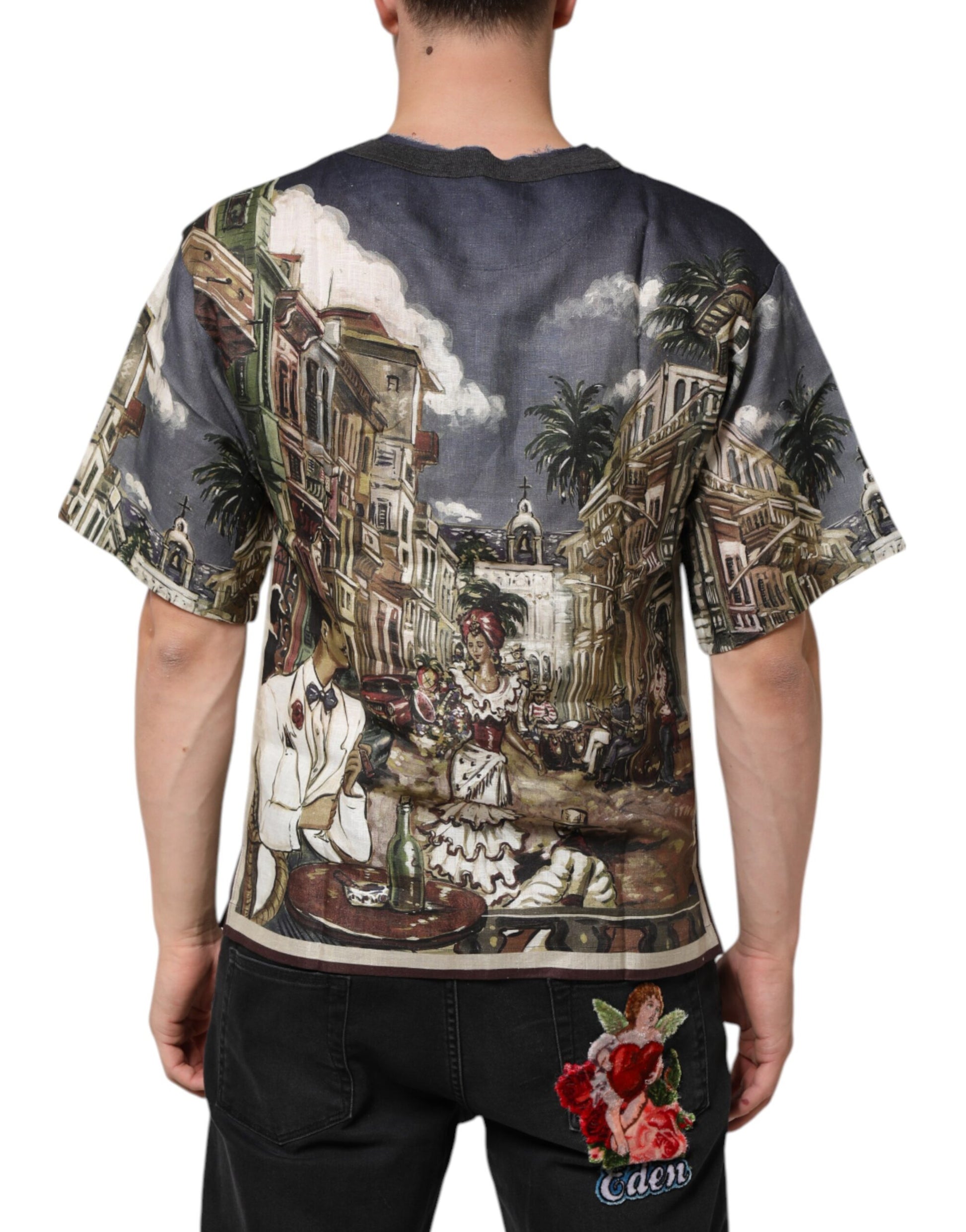 Back view of a man's shirt featuring a colorful print of a city street scene