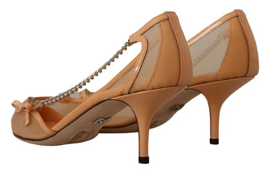 Pair of women's high heel shoes with ankle strap and rhinestone detailing
