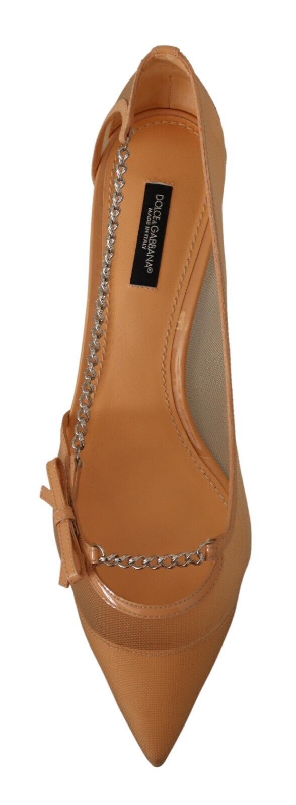 A single shoe against a neutral background. It is a women's flat with a pointed toe and embellished with what appears to