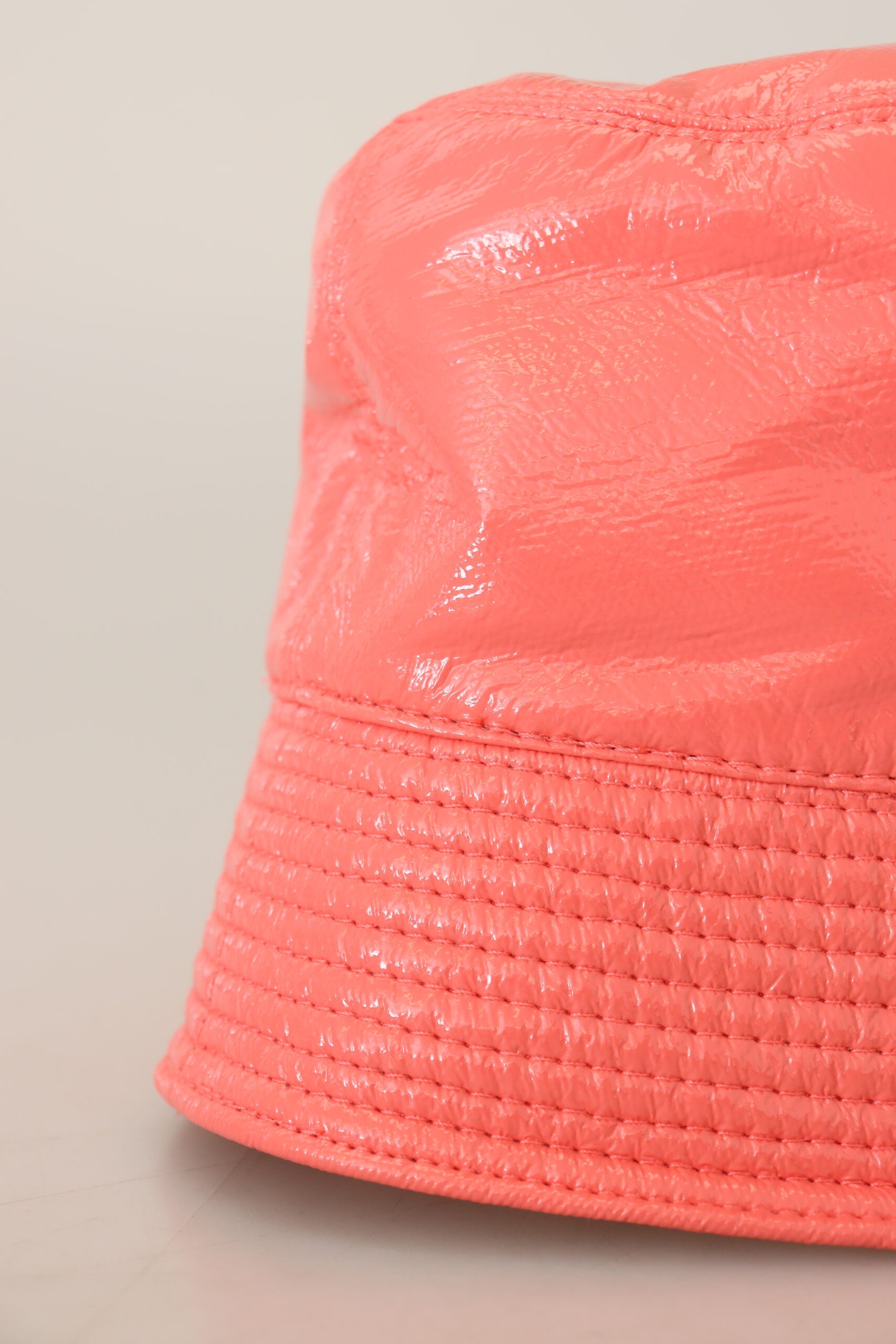 Bright orange hat with a textured surface