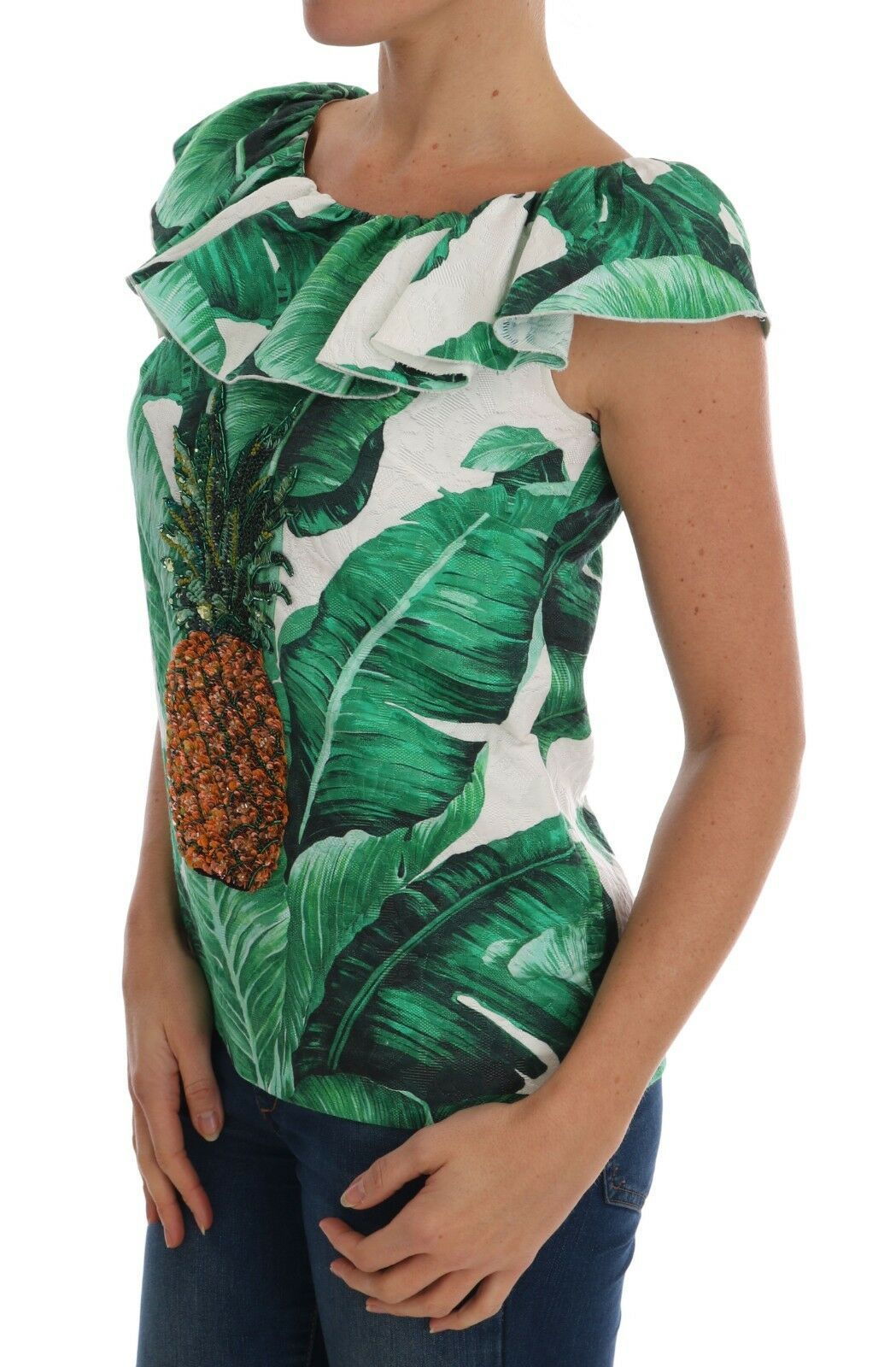 Woman wearing a top with tropical print