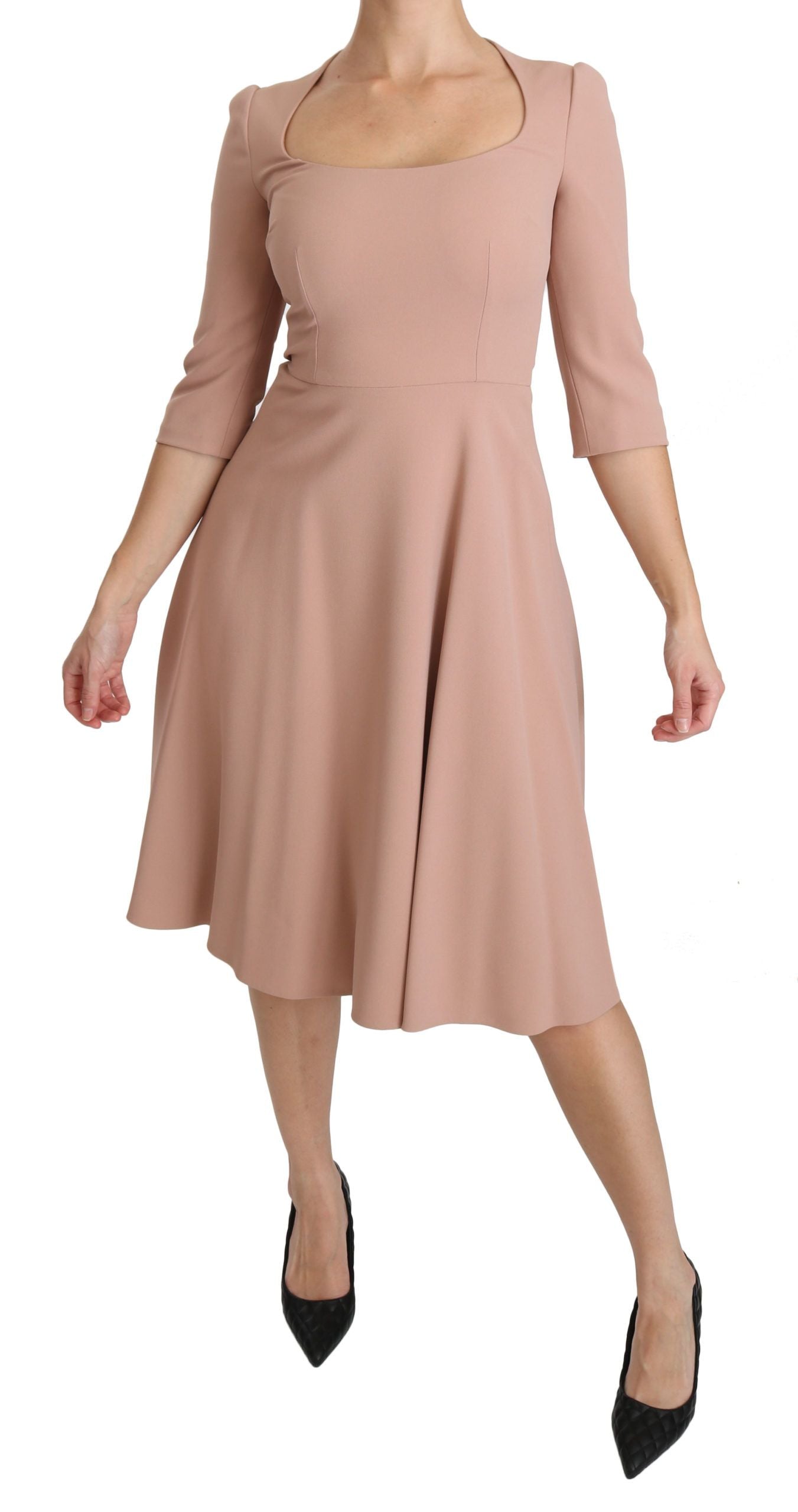 Pink dress with 3/4 sleeves and a flared skirt
