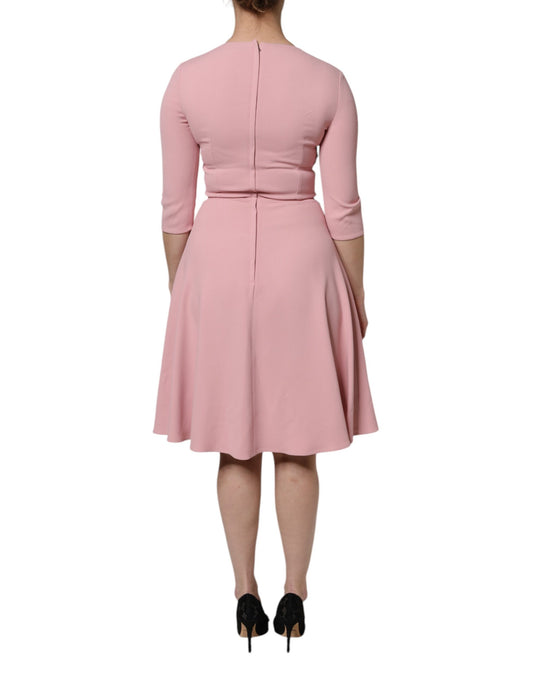 Pink dress with flared skirt and 3/4 sleeves