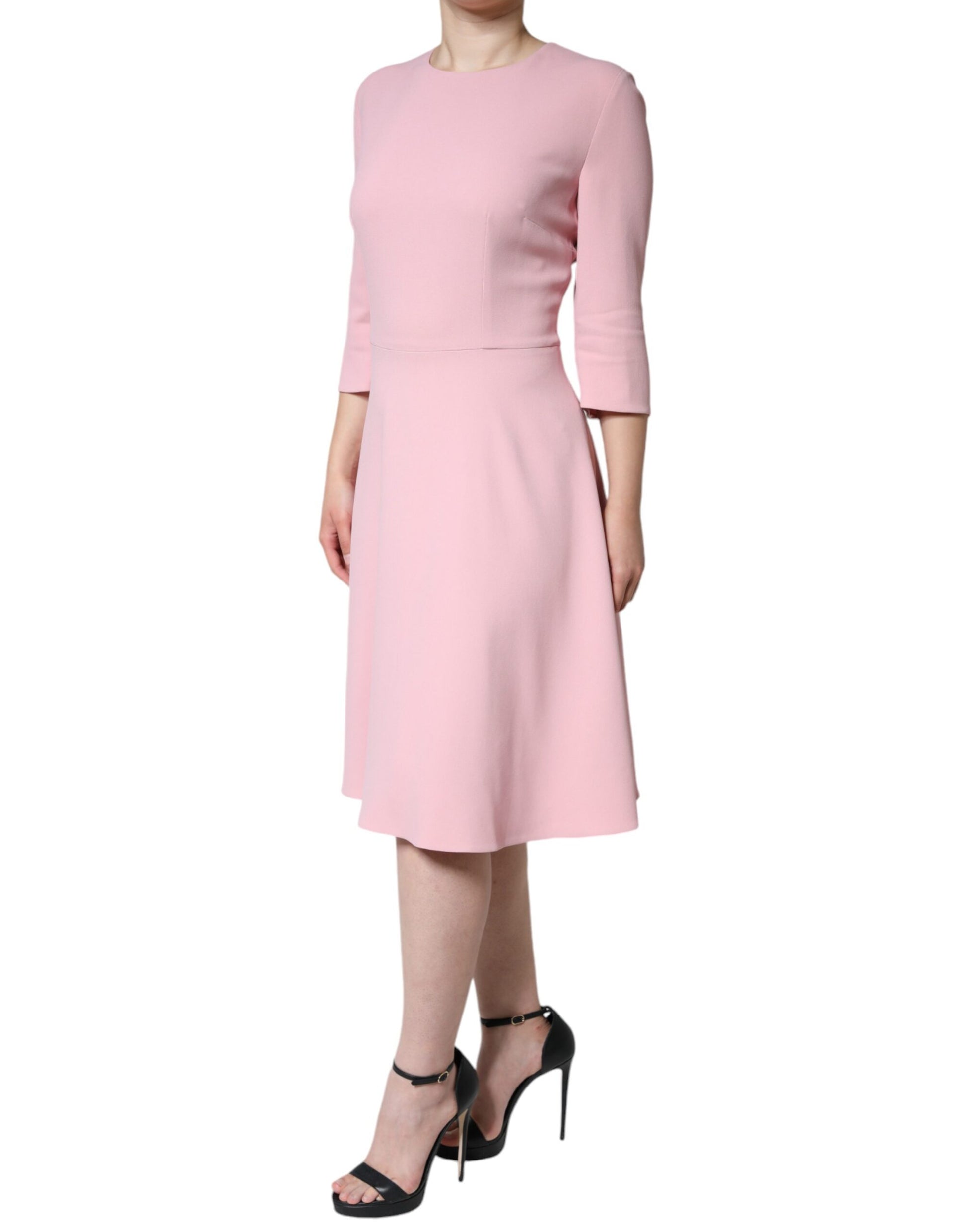 Pink dress with long sleeves and a flared skirt