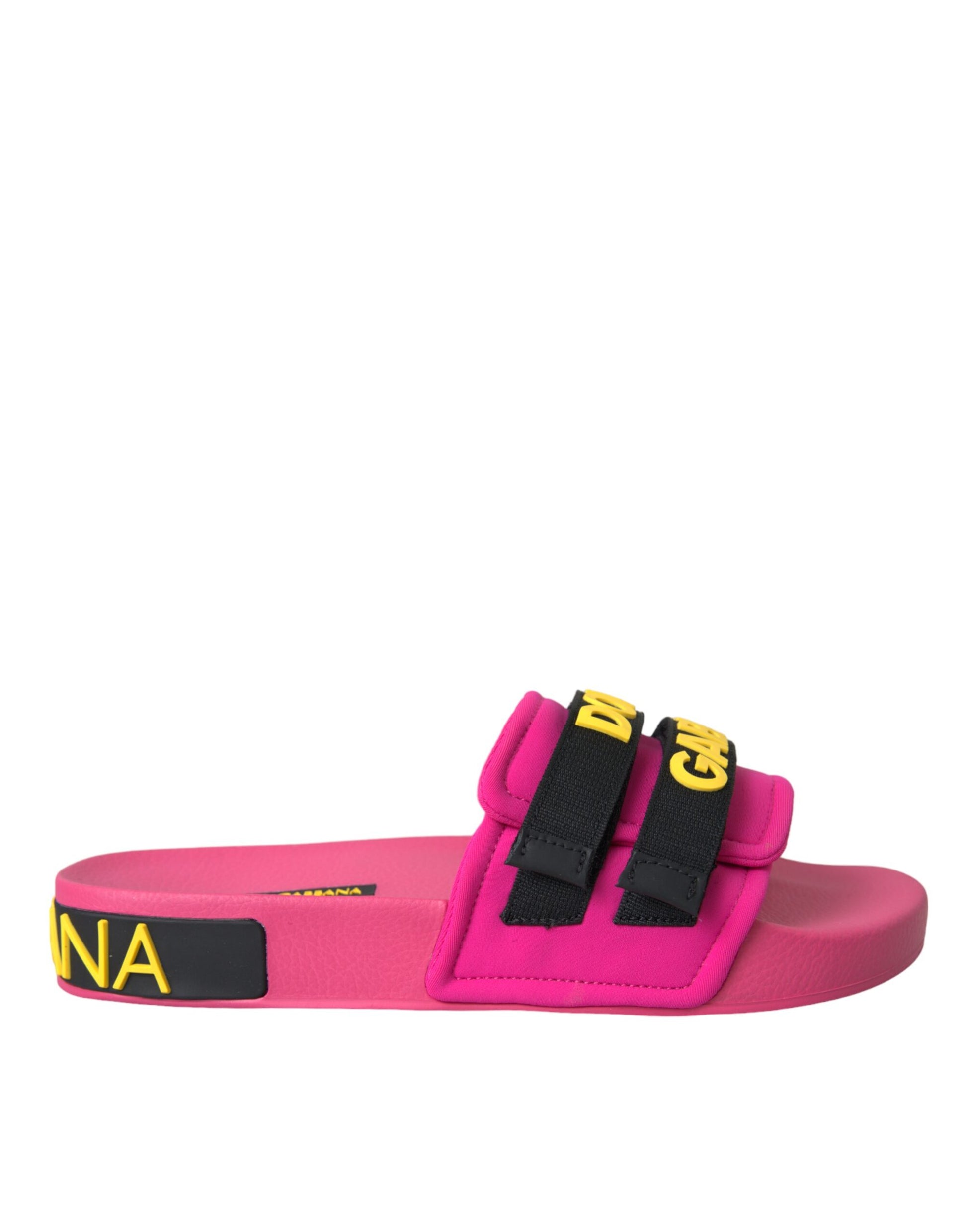 Pink sandal with black straps and yellow lettering