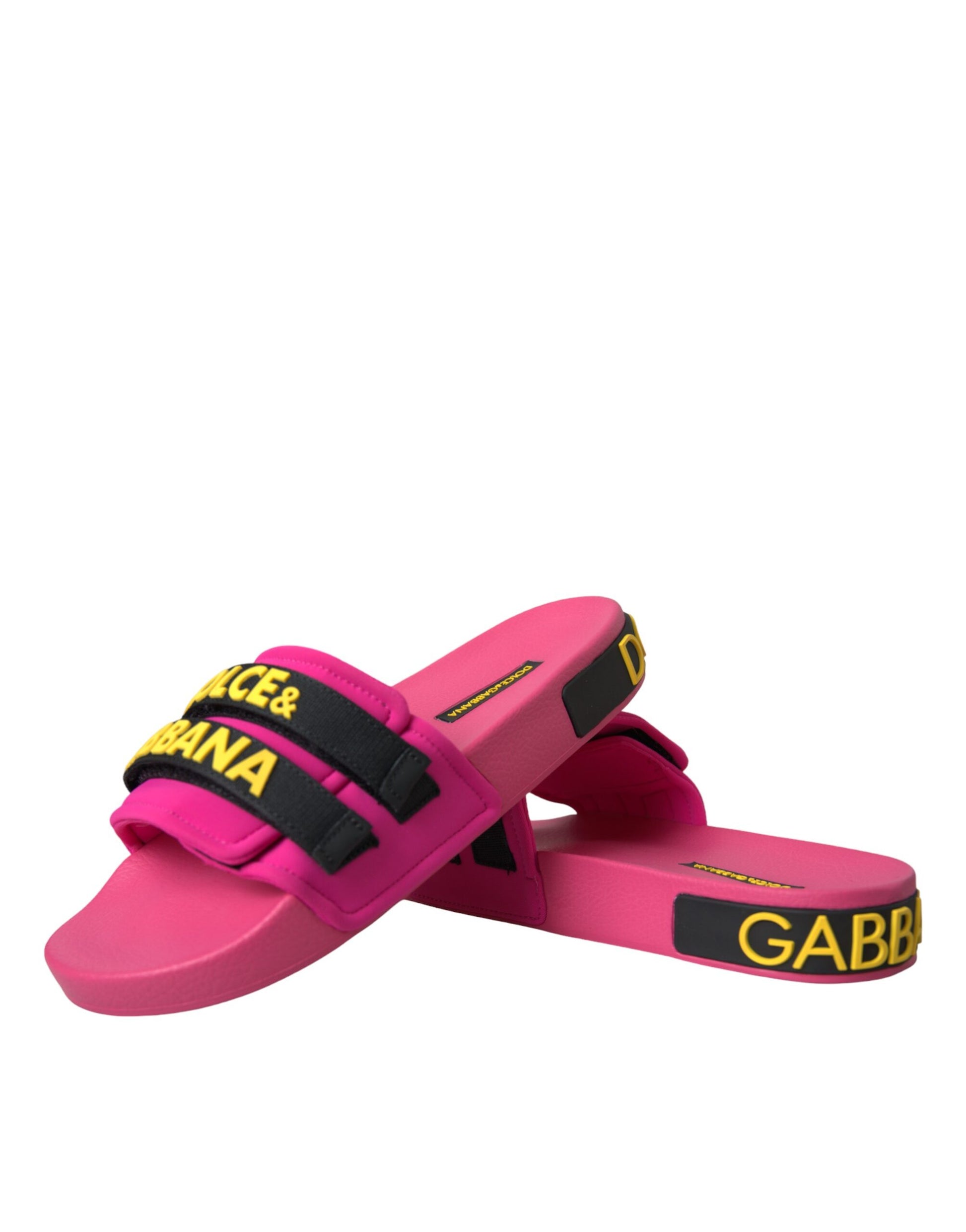 Pair of pink flip flops with black straps