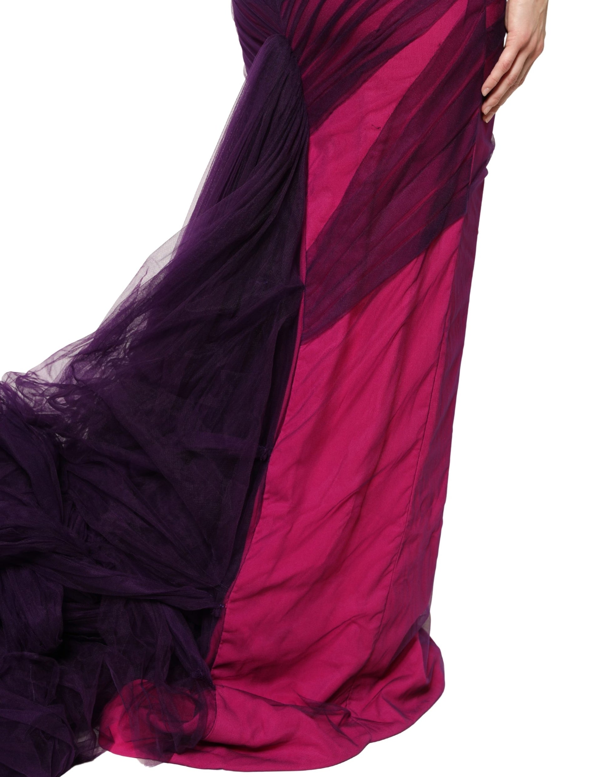 A long pink and black strapless sheath mermaid dress with a flowing skirt