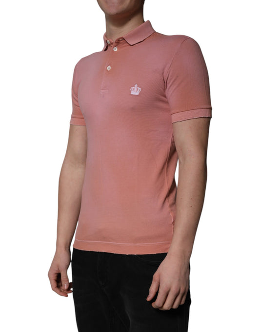 Pink polo shirt with short sleeves and collar