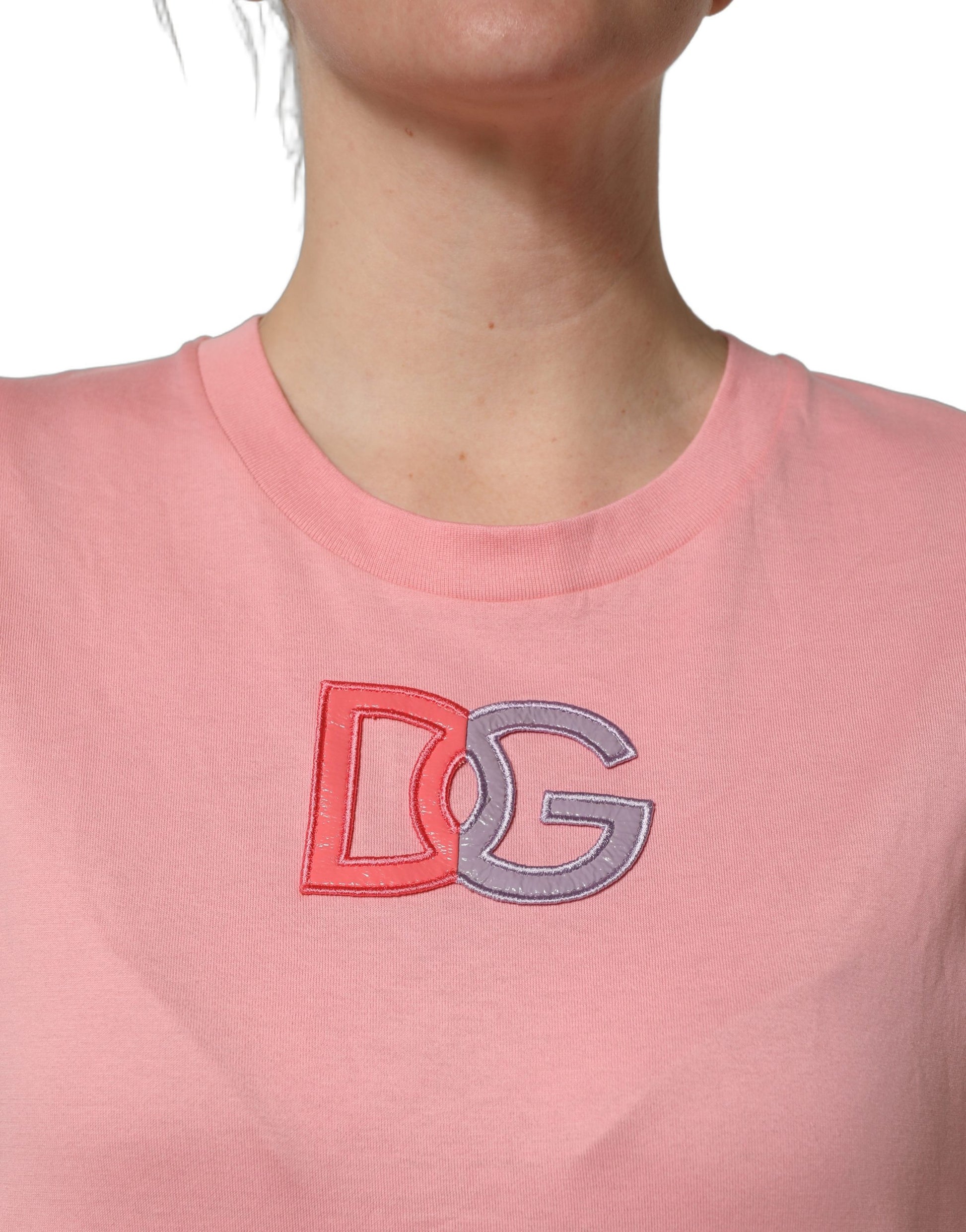 A pink cotton tank top with a round neck and the Dolce & Gabbana logo embroidered on the front