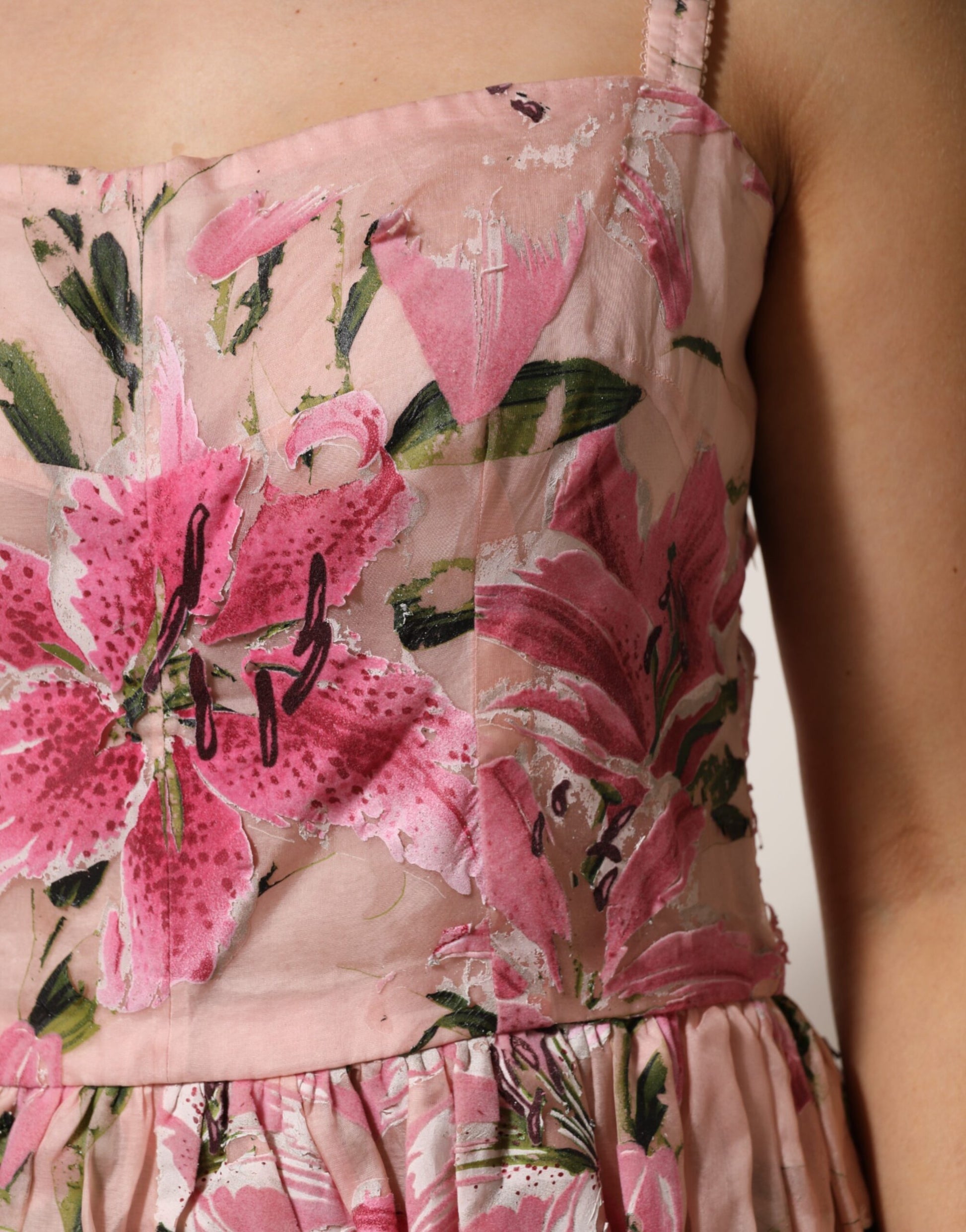 A pink floral pleated sleeveless dress from Dolce & Gabbana