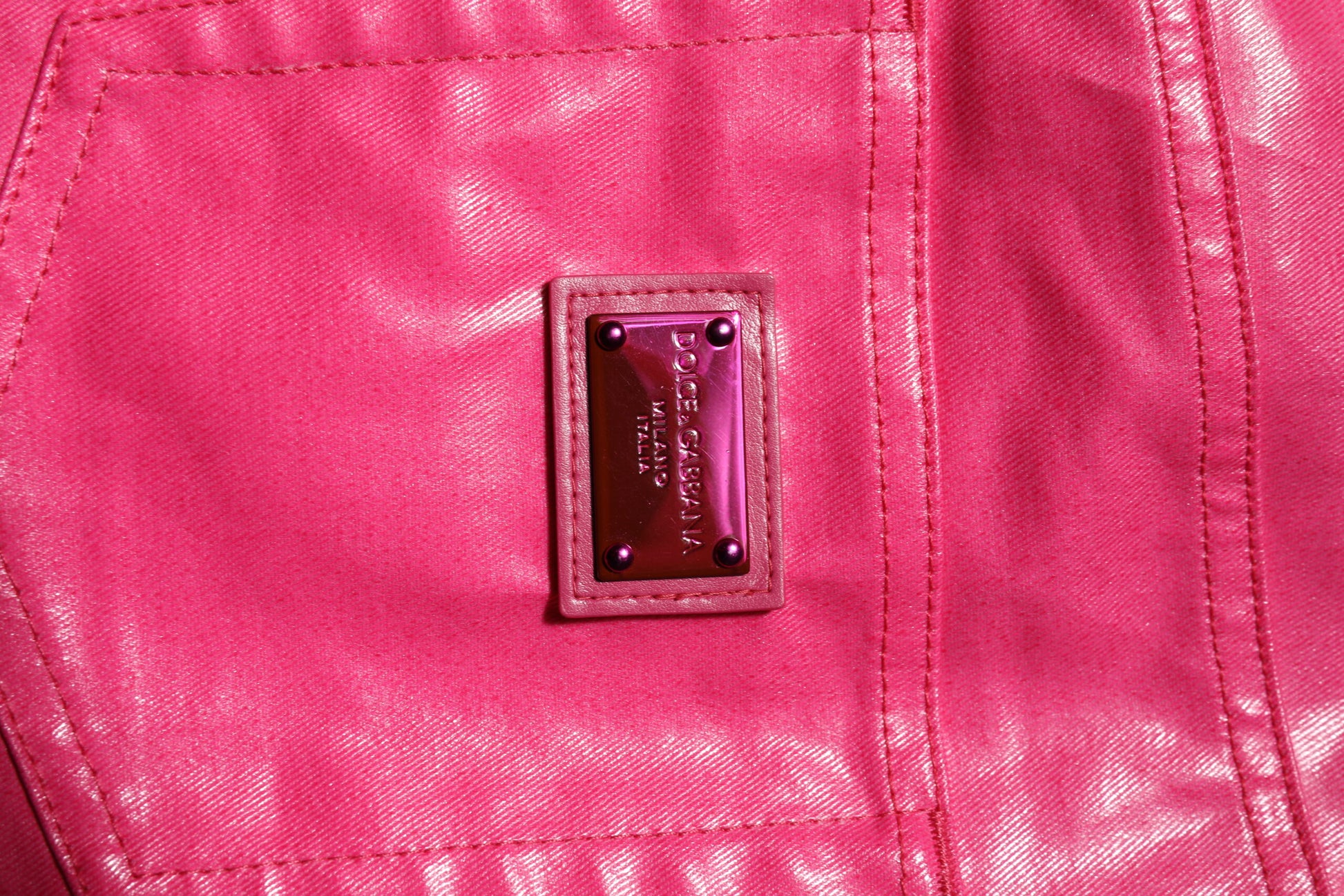 Pink leather jacket with label on back