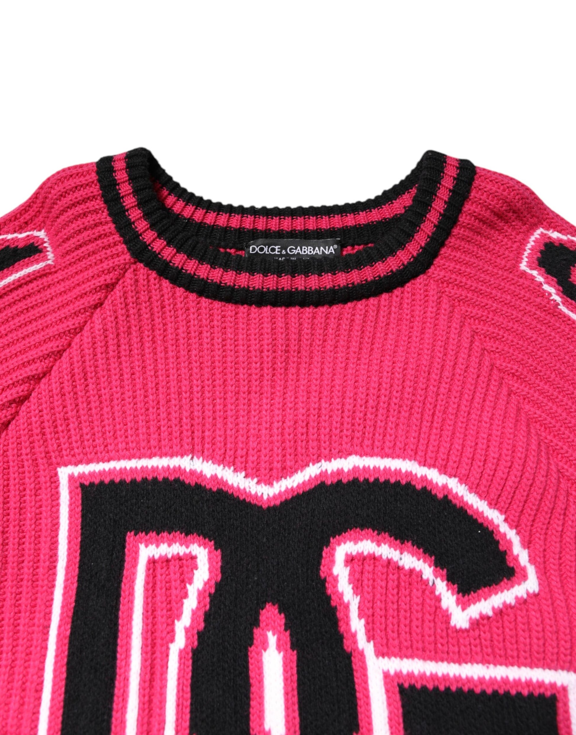 Pink sweater with black lettering