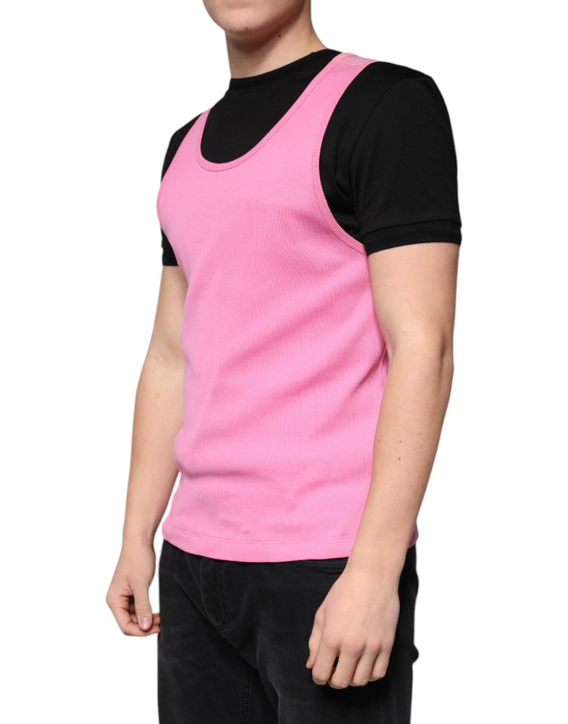 Man wearing pink vest over black shirt