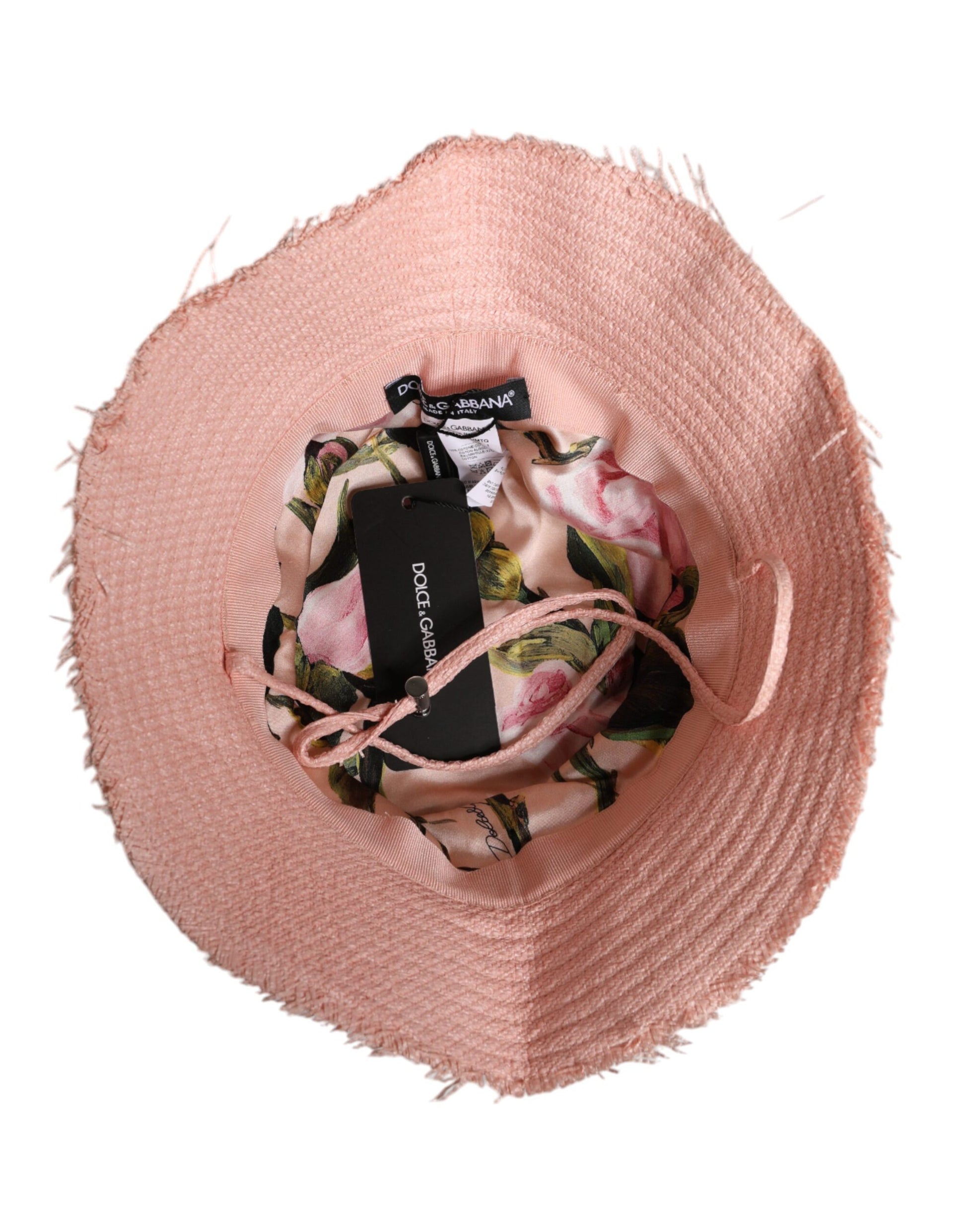 Pink straw hat with floral pattern inside