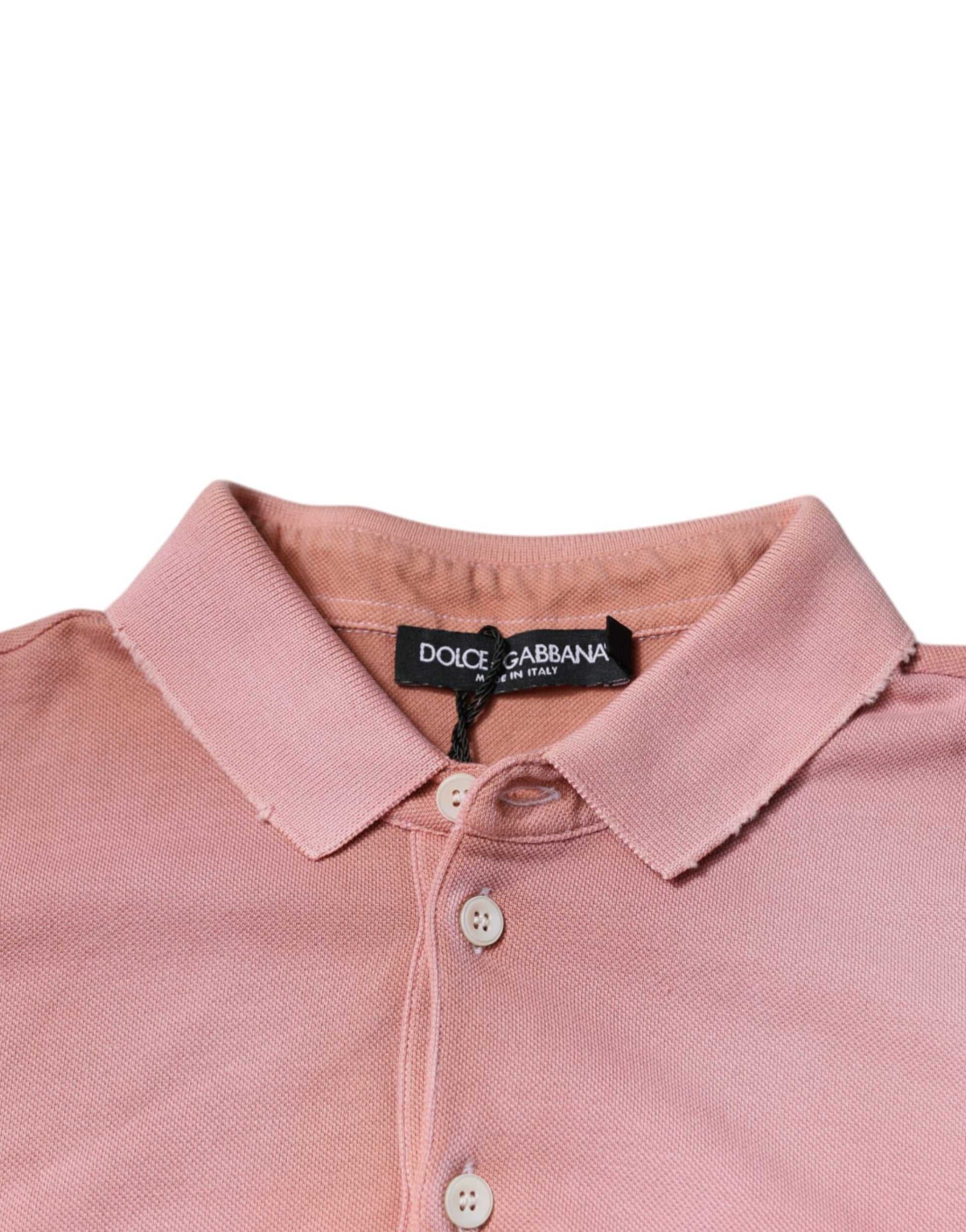 Pink polo shirt on hanger