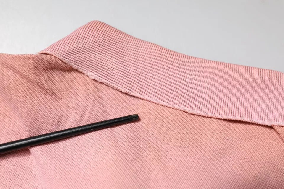 Pink sweater with black zipper