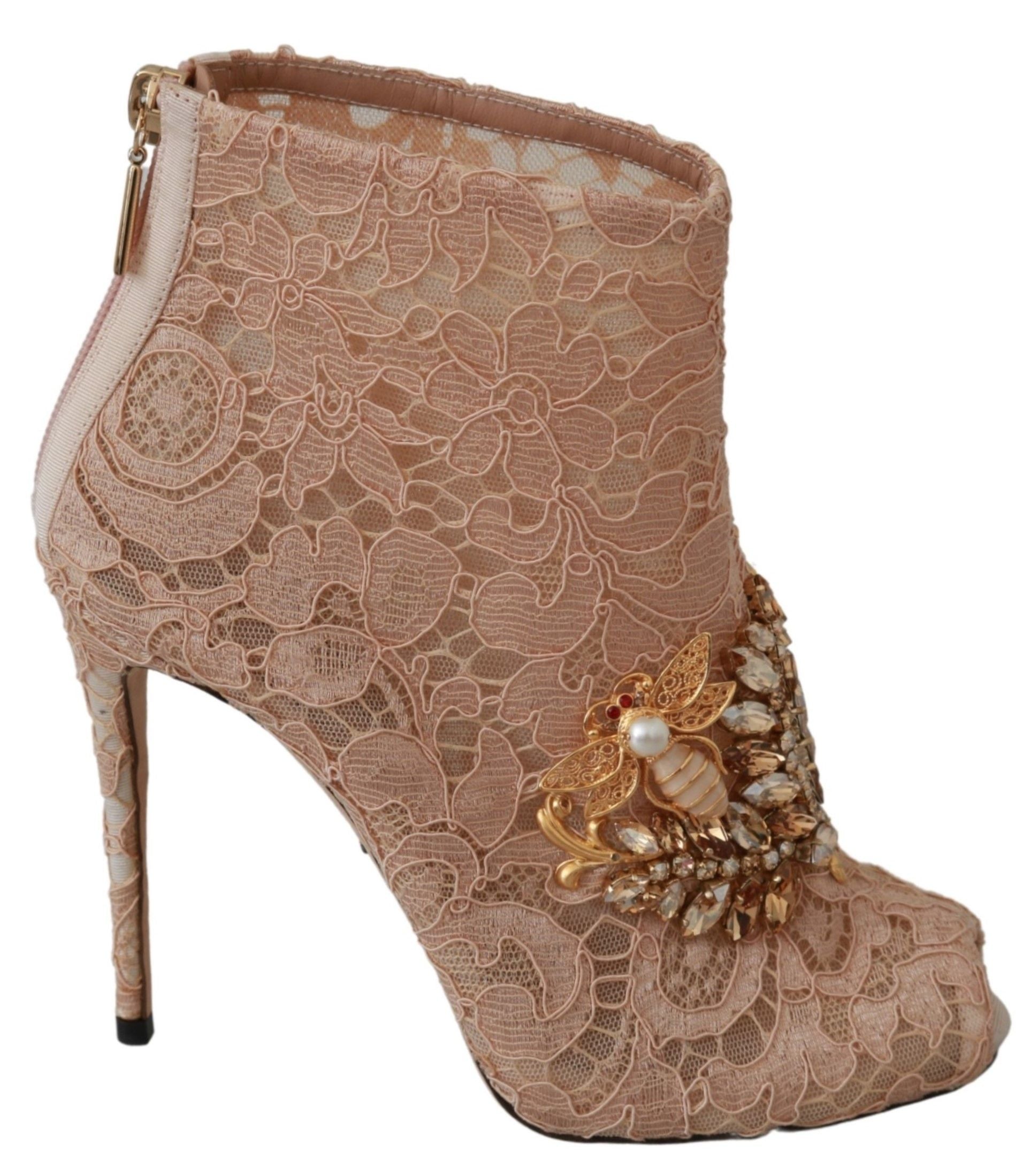 Pair of high heel shoes with embellishments and lace design