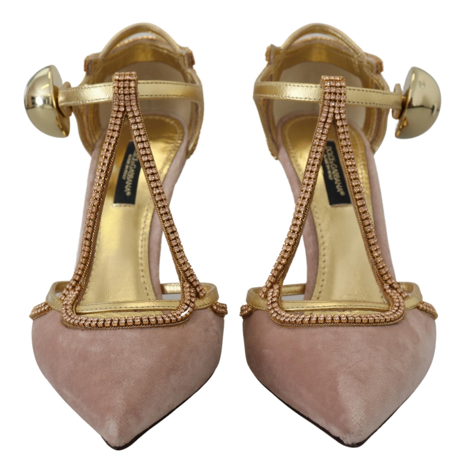 Pair of women's shoes with gold accents and pink heels