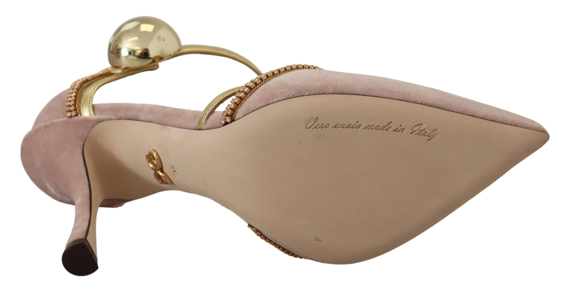 Pink high heel shoe with gold accents and a bow on top