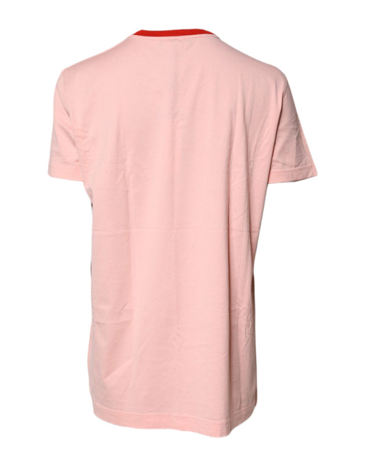 Pink short sleeve t-shirt on a hanger