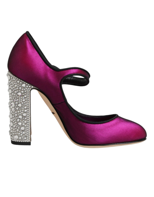Pair of purple high heel shoes with rhinestones on toe