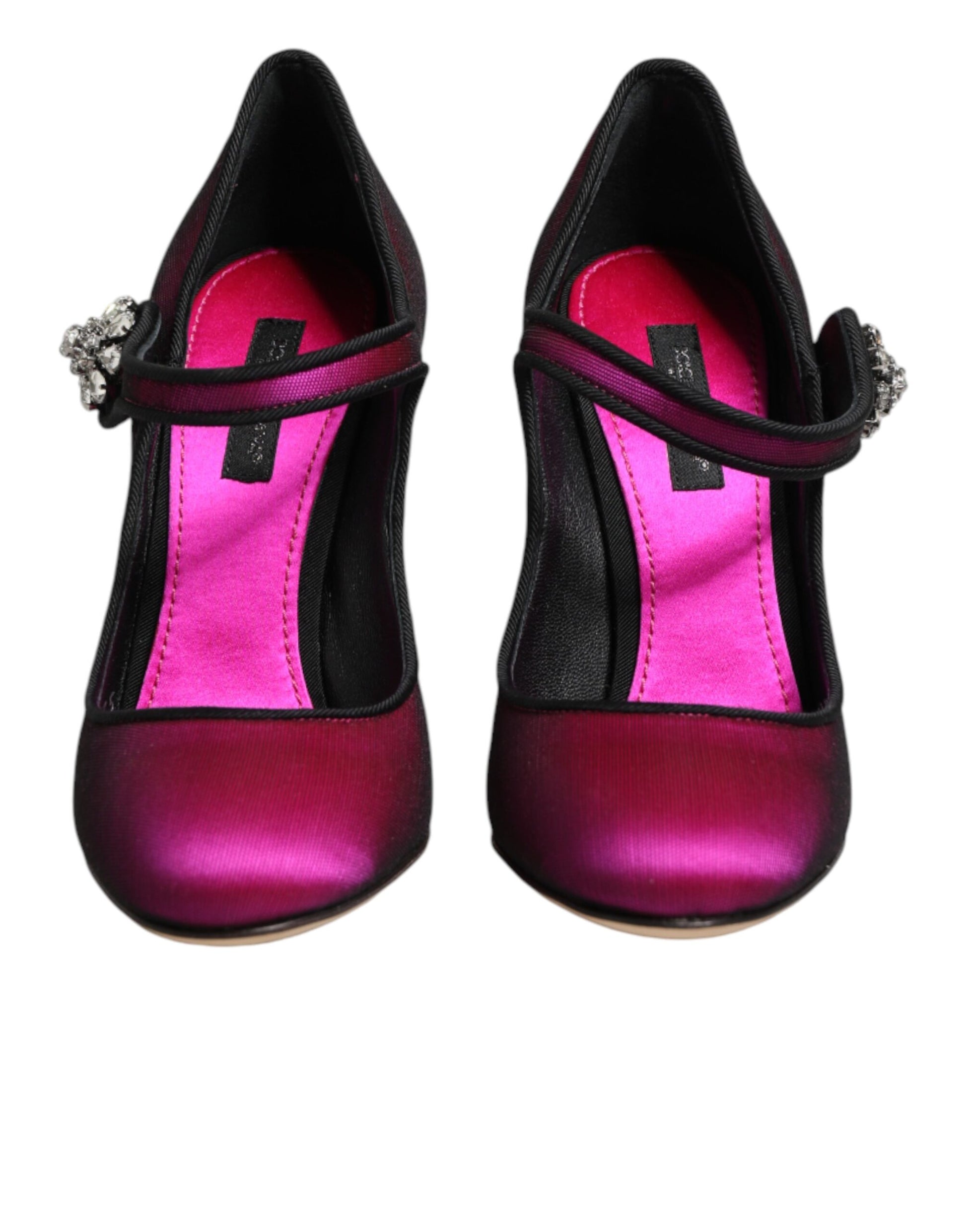 Pair of pink and black high heel shoes