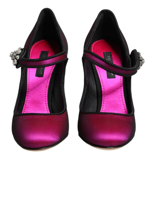 Pair of pink and black high heel shoes