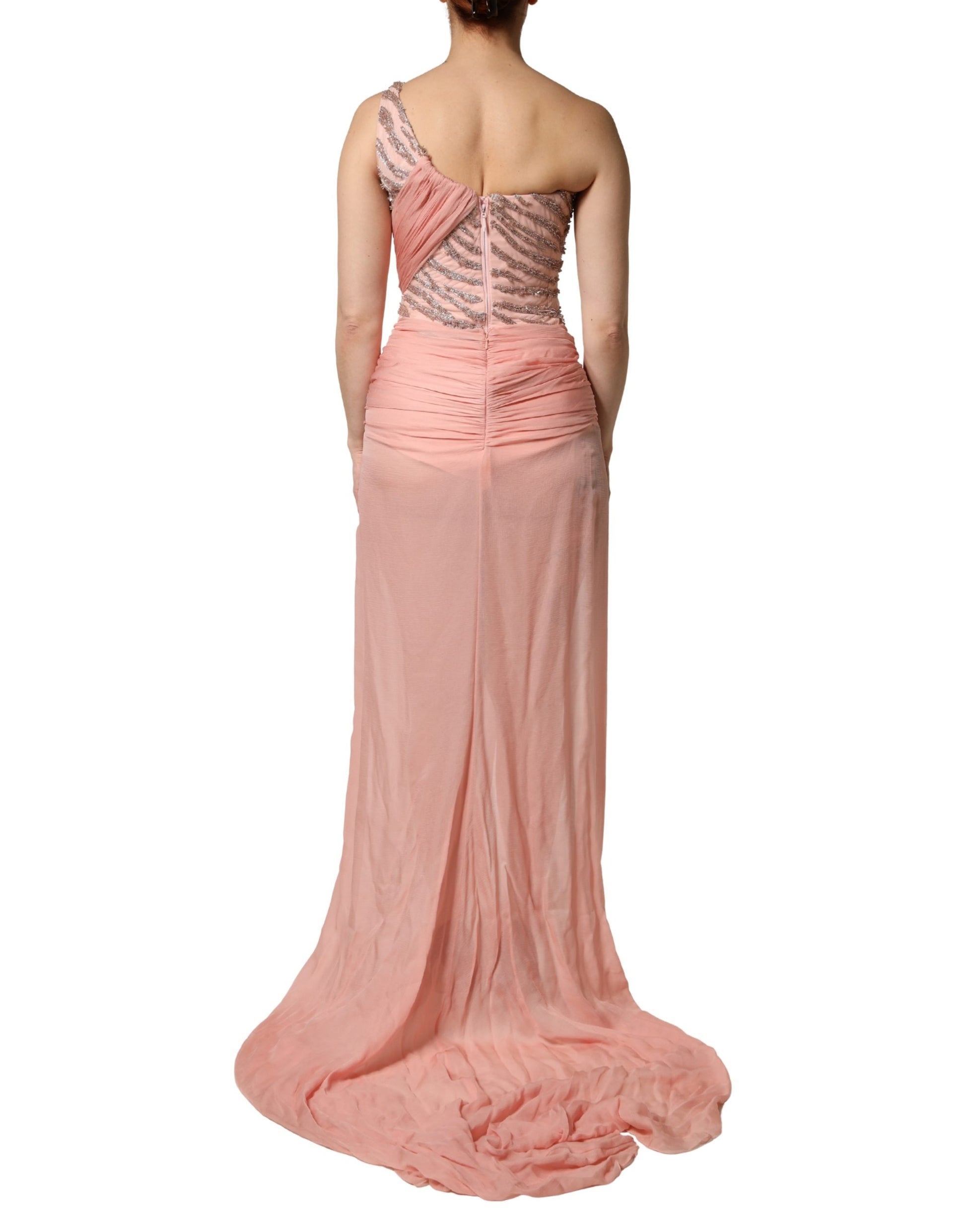A pink embellished one shoulder maxi dress by Dolce & Gabbana