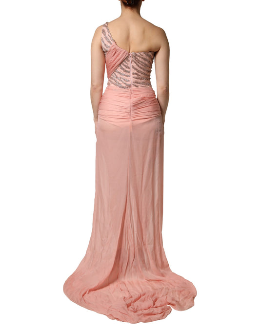 A pink embellished one shoulder maxi dress by Dolce & Gabbana