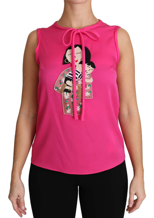 Pink tank top with graphic print on front