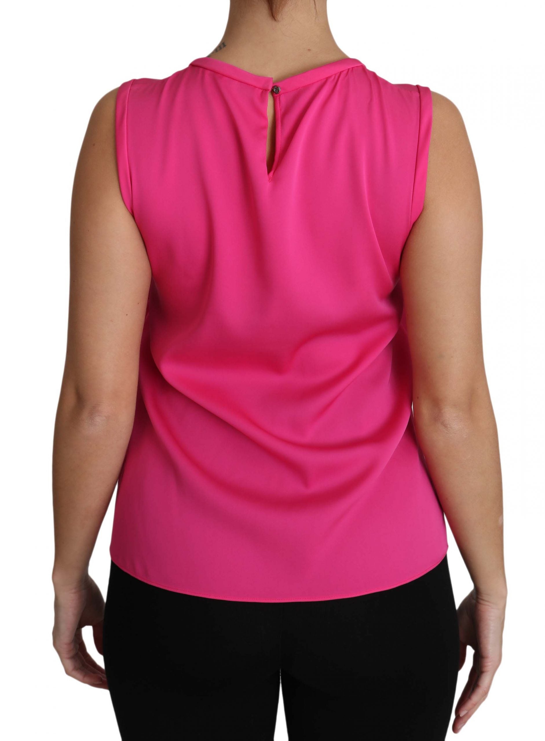 Pink sleeveless top on a woman's back