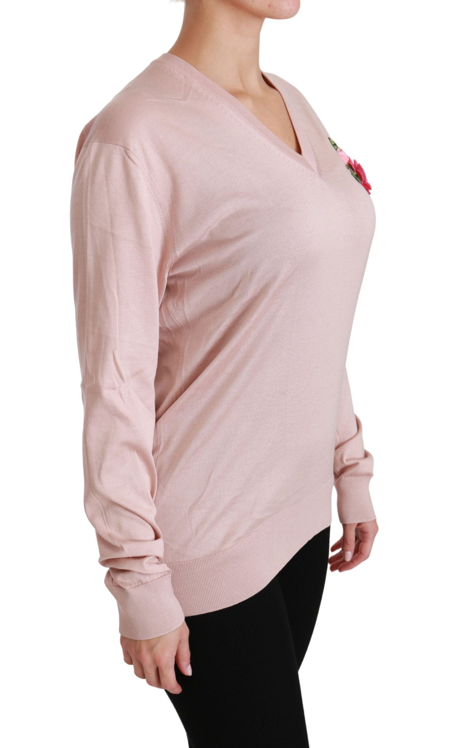 Long sleeve pink sweater on woman